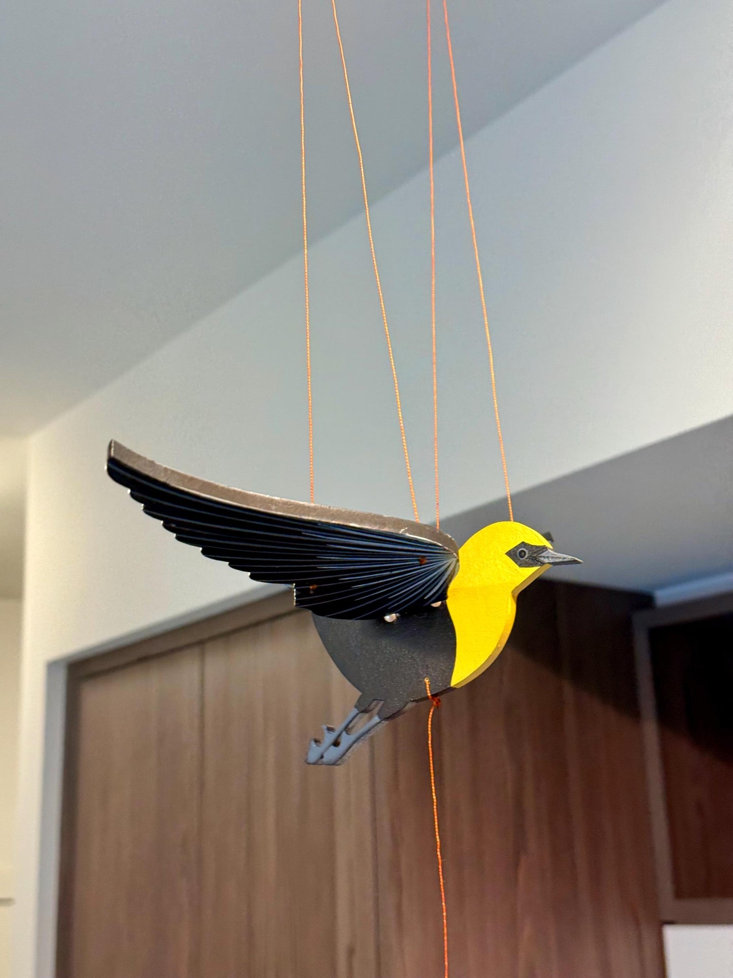 Saffron Yellow Flying Mobile