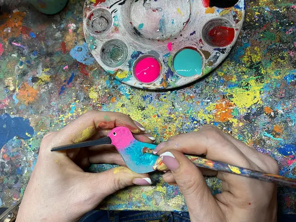 Hand-painted wooden flying mobile by Sol de Madera