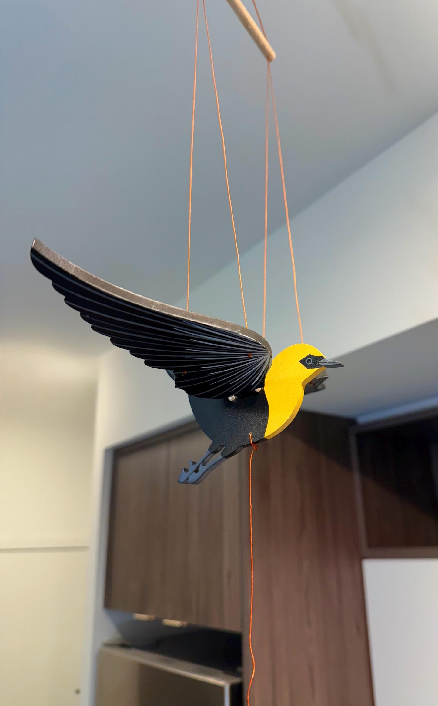 Saffron Yellow Flying Mobile
